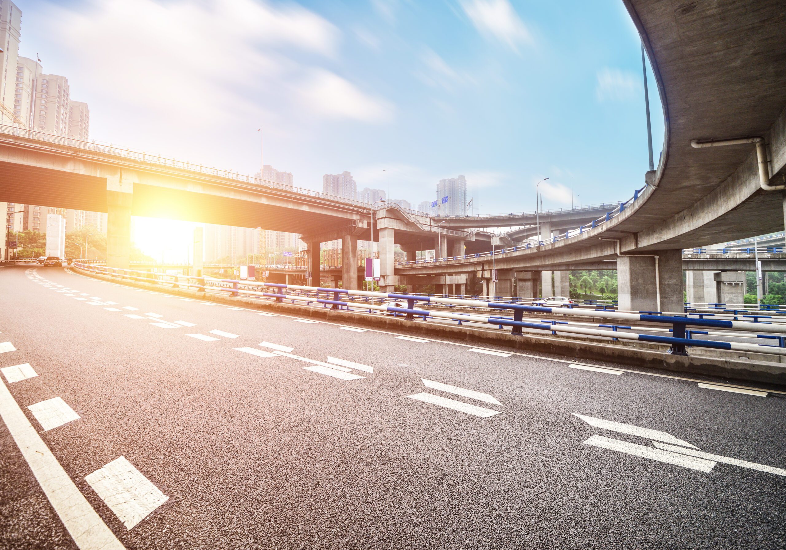 Highway overpass motion blur with city background .